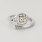 14K Gold Tennis Ball Ring with silver racquet detail and gold ball on grey
