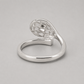 14K Gold Tennis Ball Ring with polished silver racquet design on grey