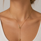 Ball Through Tennis Racquet Necklace