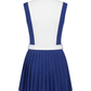 Back product image of a women’s tennis dress highlighting pleated skirt structure and tailored fit.