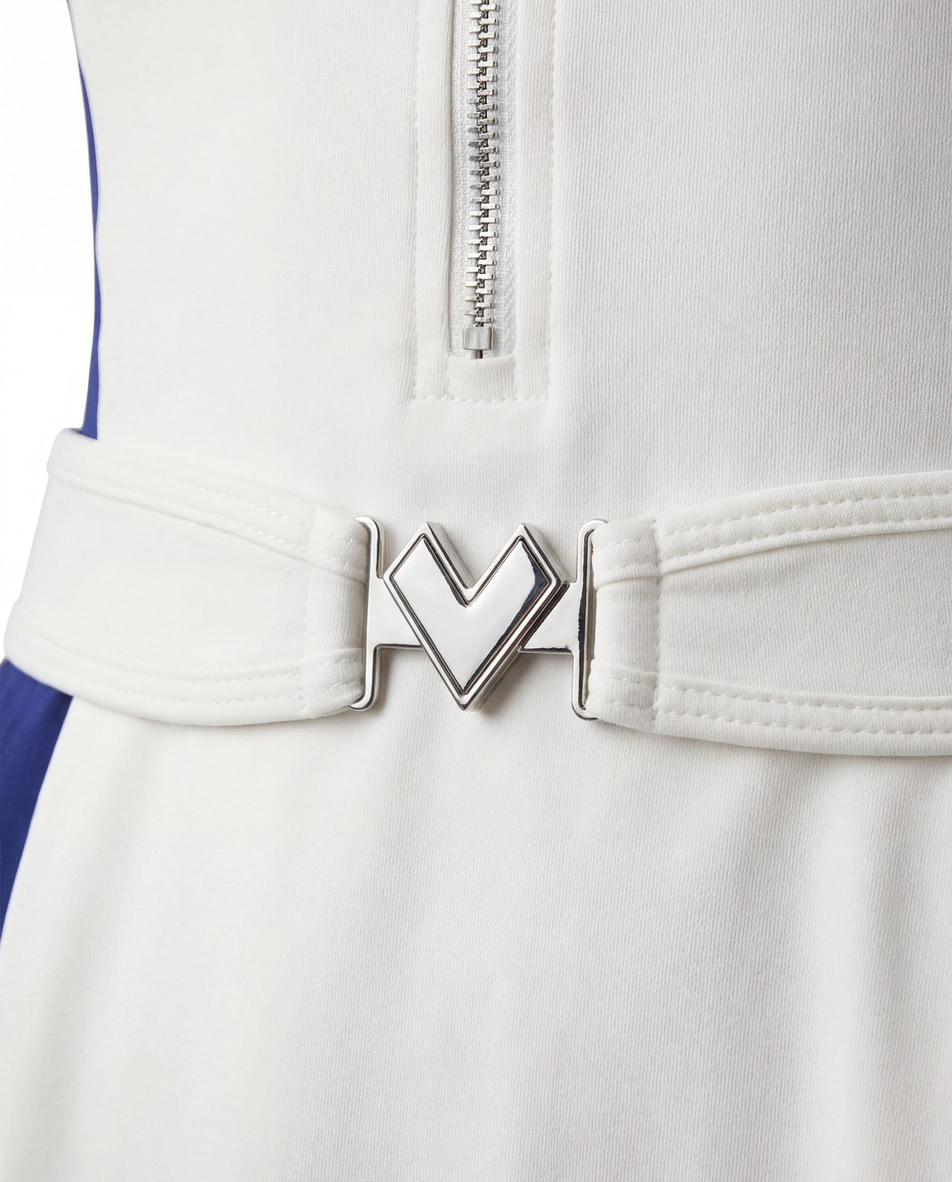 Detail shot of a belt and waist feature on a women’s tennis dress, designed for support and a flattering silhouette.