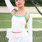 Lifestyle image of a women’s tennis tank top paired with a pleated skort, designed for performance and warm-weather play.