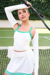 Lifestyle image of a women’s tennis tank top paired with a pleated skort, designed for performance and warm-weather play.