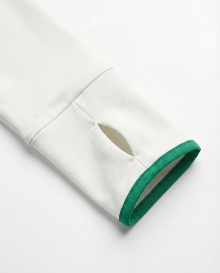 Detail shot of sleeve cuff on a long sleeve tennis top, designed to layer seamlessly with tennis tank tops.