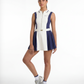 Studio shot of a women’s tennis dress with pleated skirt, showcasing a clean, modern design and athletic fit.