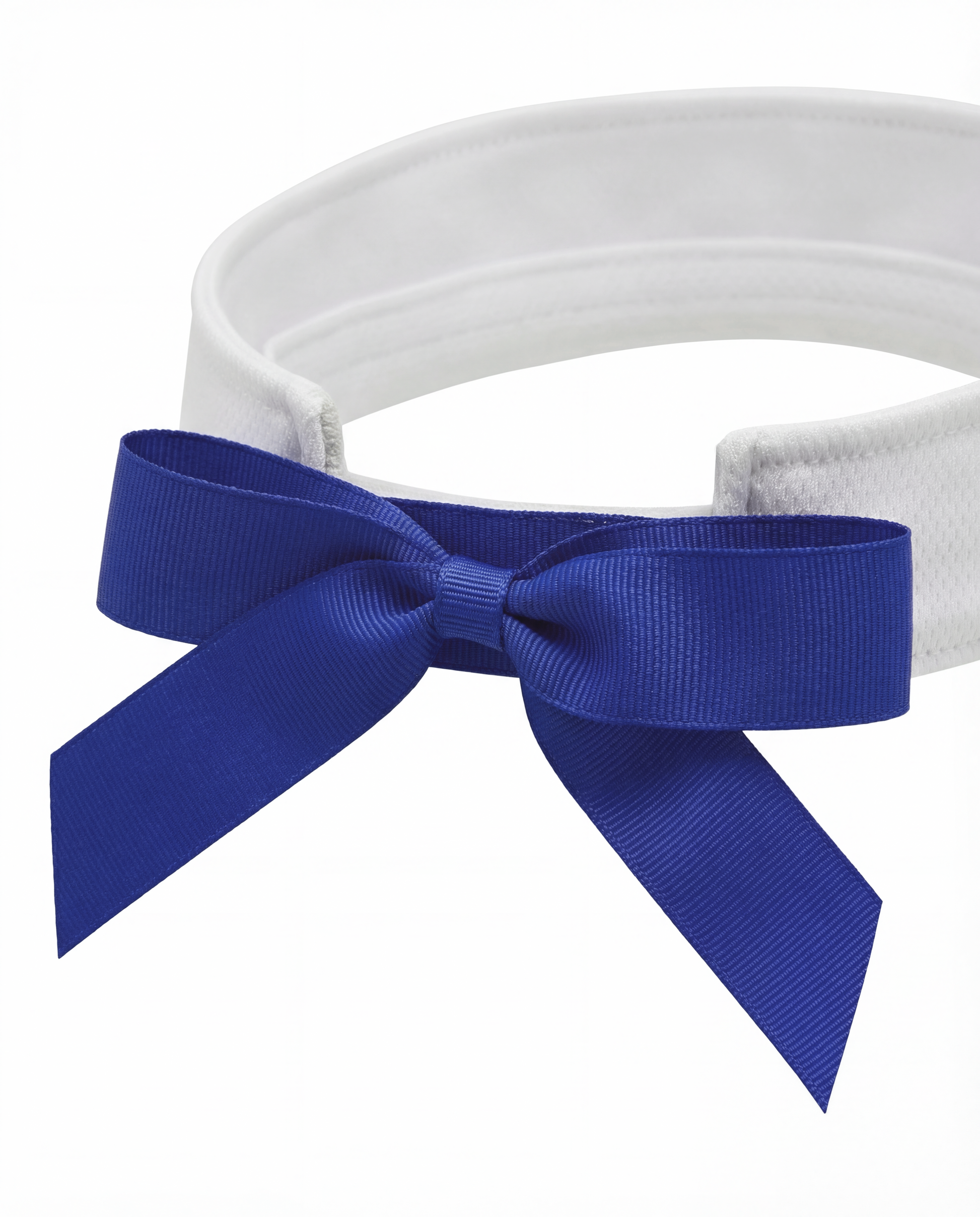 Detail shot of navy removable bow on white tennis visor, versatile tennis visor for performance and style.