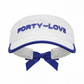 Back view of a white tennis visor with removable navy bow detail, womens tennis visor with adjustable fit.